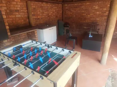 a large ping pong table in a room at American horses 2 in Pretoria