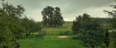 a park with a playground in the middle of a field at The Dutch House in Dullstroom