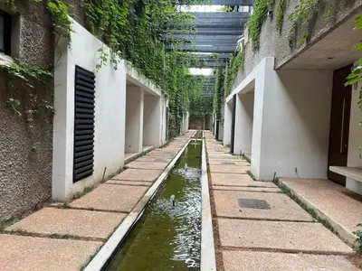an empty hallway with a pool of water in a building at 15 On Slice in Polokwane