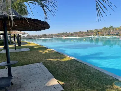 a swimming pool with a view of a body of water at The Blyde in Pretoria