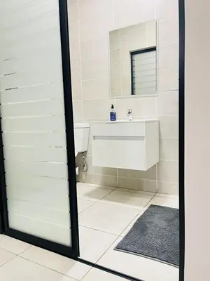 a bathroom with a sink and a mirror at The blyde apartment in Pretoria