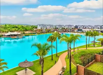 a view of the pool at the resort at The blyde apartment in Pretoria