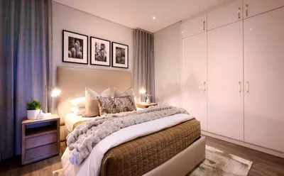 a bedroom with a large bed in a room at Luxury palace of Life in Midrand