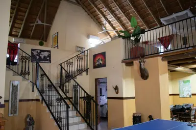 a hallway with a staircase in a house at Namagong in Marloth Park