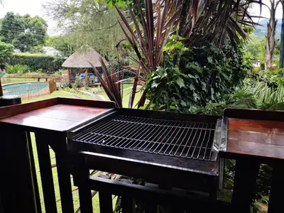 a barbecue grill sitting on top of a table at Dublin Guest House in Sabie