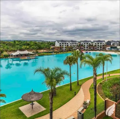 an image of a large pool at a resort at Apartment at The Blyde in Pretoria