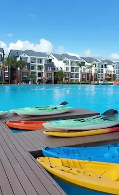 a group of kayaks lined up next to a swimming pool at The blyde crystal lagoon 116 in Pretoria