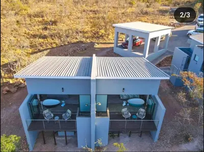 an overhead view of a house with tables and chairs at La-Ngwenya Serenite in Warmbaths