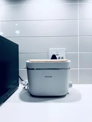 a toaster sitting on a counter next to a computer at The Blyde Pretoria 2 bed 2 bath apartment in Pretoria