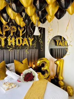 a bedroom with a bed with a bunch of balloons at The Blyde Pretoria 2 bed 2 bath apartment in Pretoria