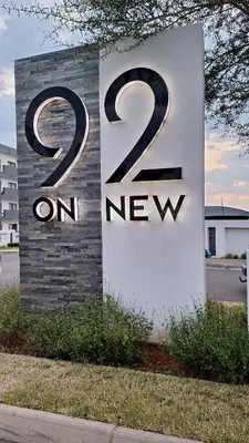 a sign that says on new at The Luxury Apartments in Midrand