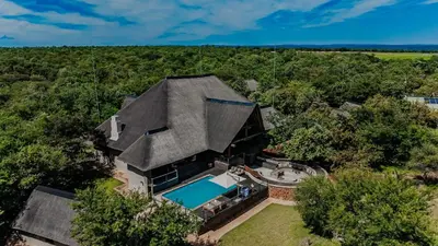 an overhead view of a house with a swimming pool at Bongela Private Game Lodge in Vaalwater