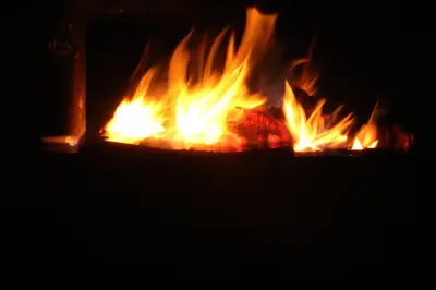 a fire oven filled with lots of fire at Roodewal Bush Lodge in Mhalamhala
