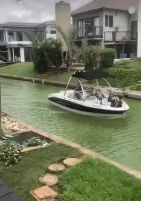 a group of people on a boat in a river at Lake Villa Hartebees in Hartbeespoort