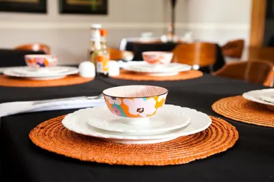 a table with plates and a cup on top at The Gables Middelburg MPU in Middelburg