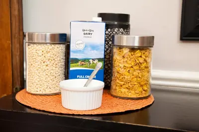 a table with three jars of oats and a box at The Gables Middelburg MPU in Middelburg