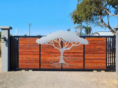 a gate with a tree on it with snow on it at Nonaka in Louis Trichardt