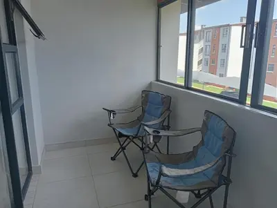 two chairs sitting in a room with a window at Irene Moo Stay in Pretoria