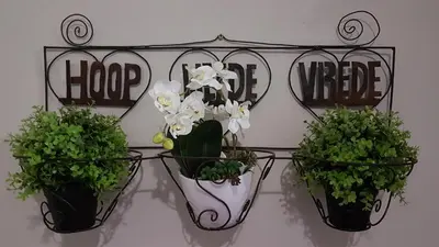 three potted plants on a shelf with the words hope and mercy at Private Apartments & Biz Stays Pretoria in Pretoria