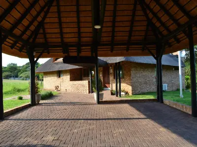 an open pavilion with a building in the background at Kruger Park Lodges - Pangane M Properties Unit 538, 571A, 571B in Hazyview