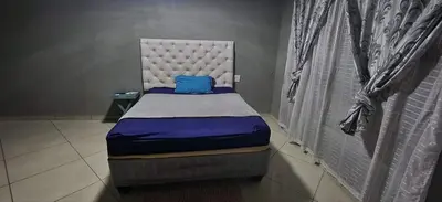 a small bed in a room with a window at Musanda Lifestyle Centre in Makonde