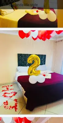a bedroom with a bed with a number two on it at Musanda Lifestyle Centre in Makonde