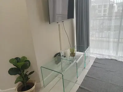 a glass table in a living room with a window at Kayalako at theBlyde 1 in Pretoria