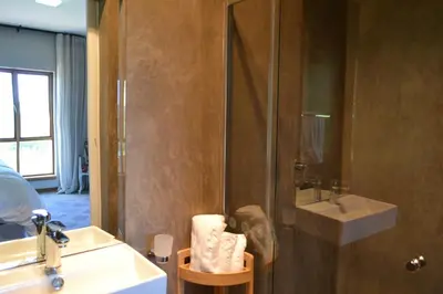 a bathroom with a sink and a shower at 22 on Ridgeway in Dullstroom