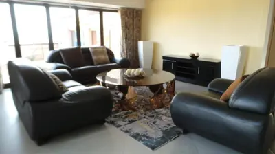 a living room with two chairs and a table at Amatolo view in Erasmus