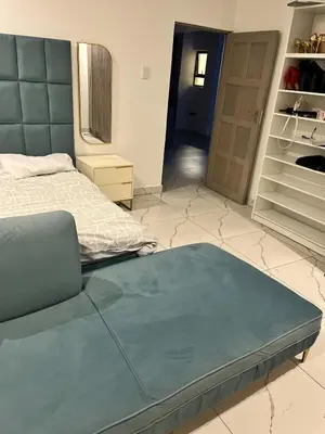 a bedroom with a large bed and a closet at Mphoentle residence in Midrand