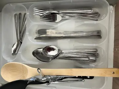 a drawer filled with silver utensils and utensils at Greencreek Lifestyle in Pretoria