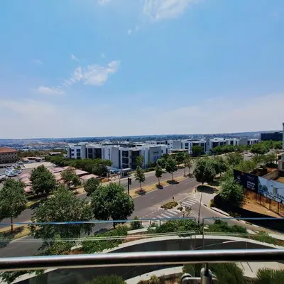 a view of a city street with buildings at Ellipse Waterfall luxurious and modern apartment in Midrand