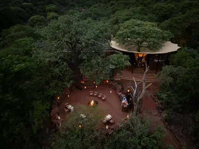 an overhead view of a building with a tree at Few and Far Luvhondo in Waterpoort
