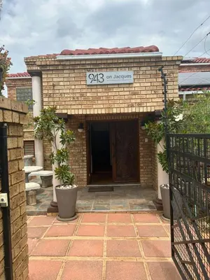 a brick building with a sign that reads srf on recovery at 943 on Jacques in Pretoria