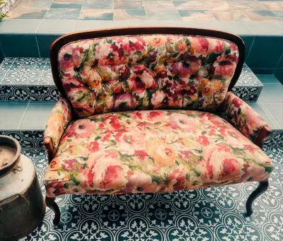 a chair with a blanket on it in a room at casa bella in Hartbeespoort