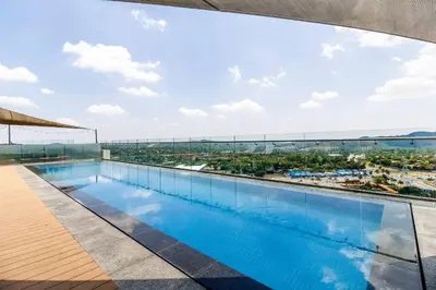 a swimming pool on the roof of a building at Urban Luxury at The Trilogy in Pretoria