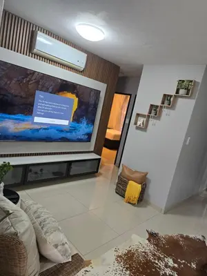 a living room with a large flat screen tv at Ikar's Haven in Centurion