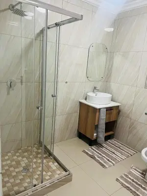 a bathroom with a sink and a shower at U4 KT View in Midrand