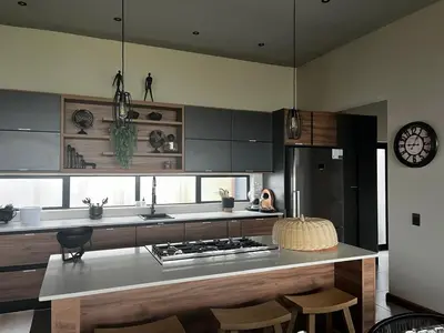 a kitchen with a counter and a stove top oven at Ironwood Manor in Dullstroom