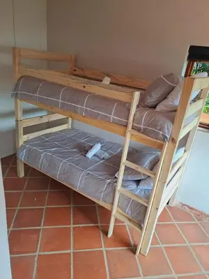 a couple of bunk beds in a room at Wakanda on Hartbeespoort Dam in Hartbeespoort