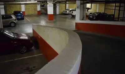 a parking lot with a skateboard ramp in a parking garage at Luxury 3-Bedroom Apartment in Midrand in Midrand