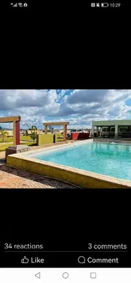 a collage of two pictures of a swimming pool at Rooibok Gardens in Mokopane