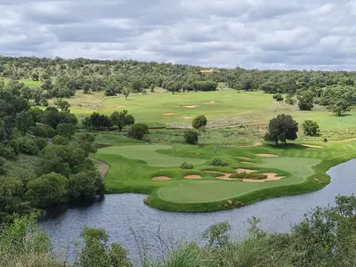 an aerial view of a golf course next to a river at Valley View Elements 4 Bedroom in Warmbaths