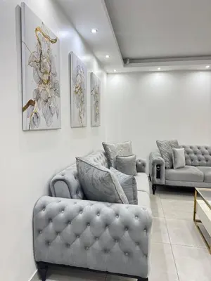 a living room with a couch and two couches at Zaidi Luxury Home in Secunda