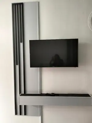 a flat screen tv hanging on a wall at 20 on Middle in Polokwane