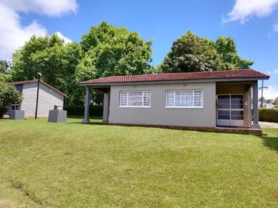 a house with a large yard at Panorama home 19 in Graskop