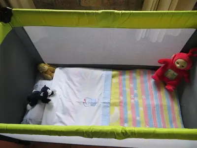 a baby crib with stuffed animals on it at Rafikis Safari at Kruger in Marloth Park