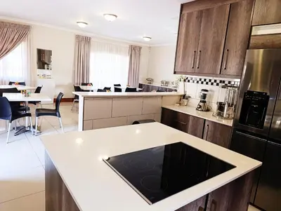 a kitchen with a white counter top in a room at Elephant villa 5 bedroom in Nelspruit