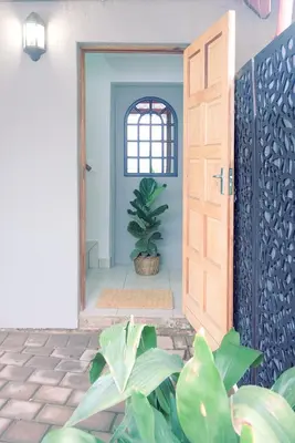 an open door with a potted plant in a room at Ryneveld Rest in Centurion