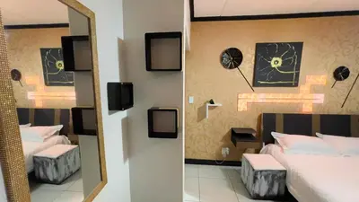 a bedroom with two beds and a mirror at Smart Home Oasis & Luxury Living in Midrand
